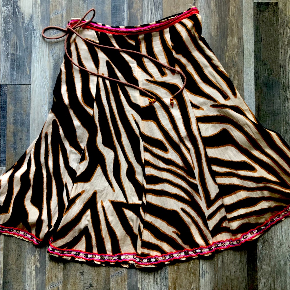 Gently used animal print, beaded skirt.